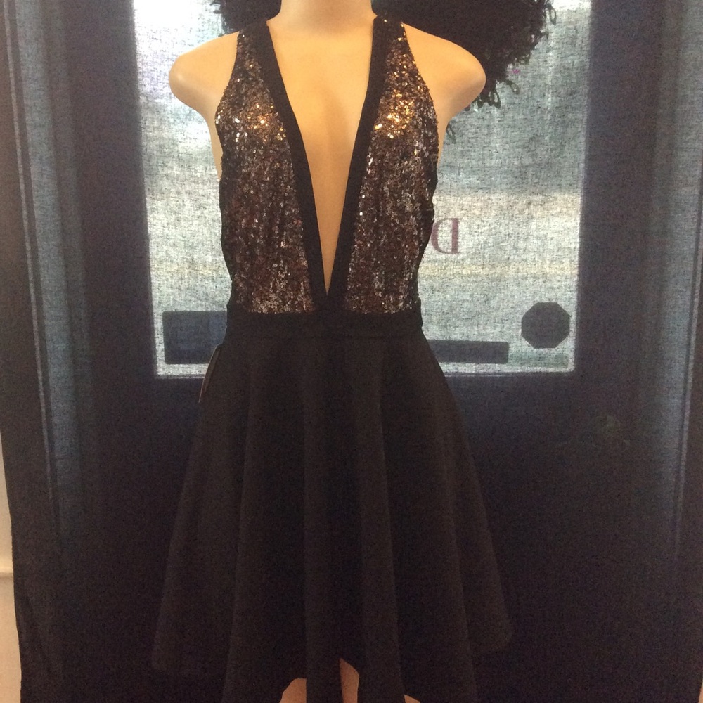 Glittering black/gold sequin dress